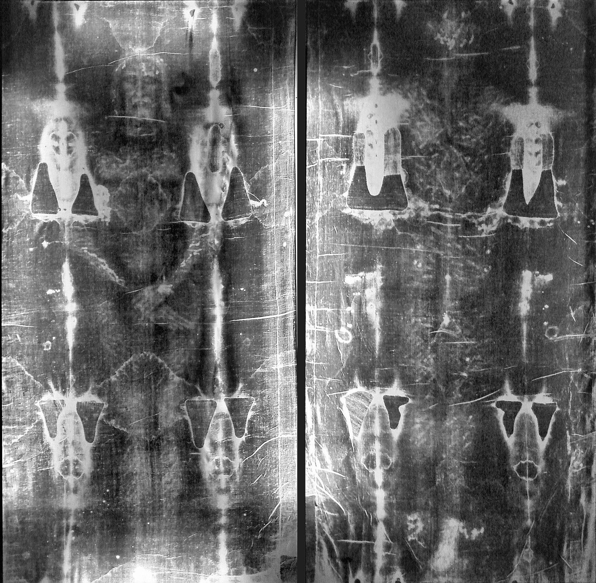 Full-length photographic negatives of the Shroud of Turin, showing the symmetrical patches and repairs made after the 1532 fire